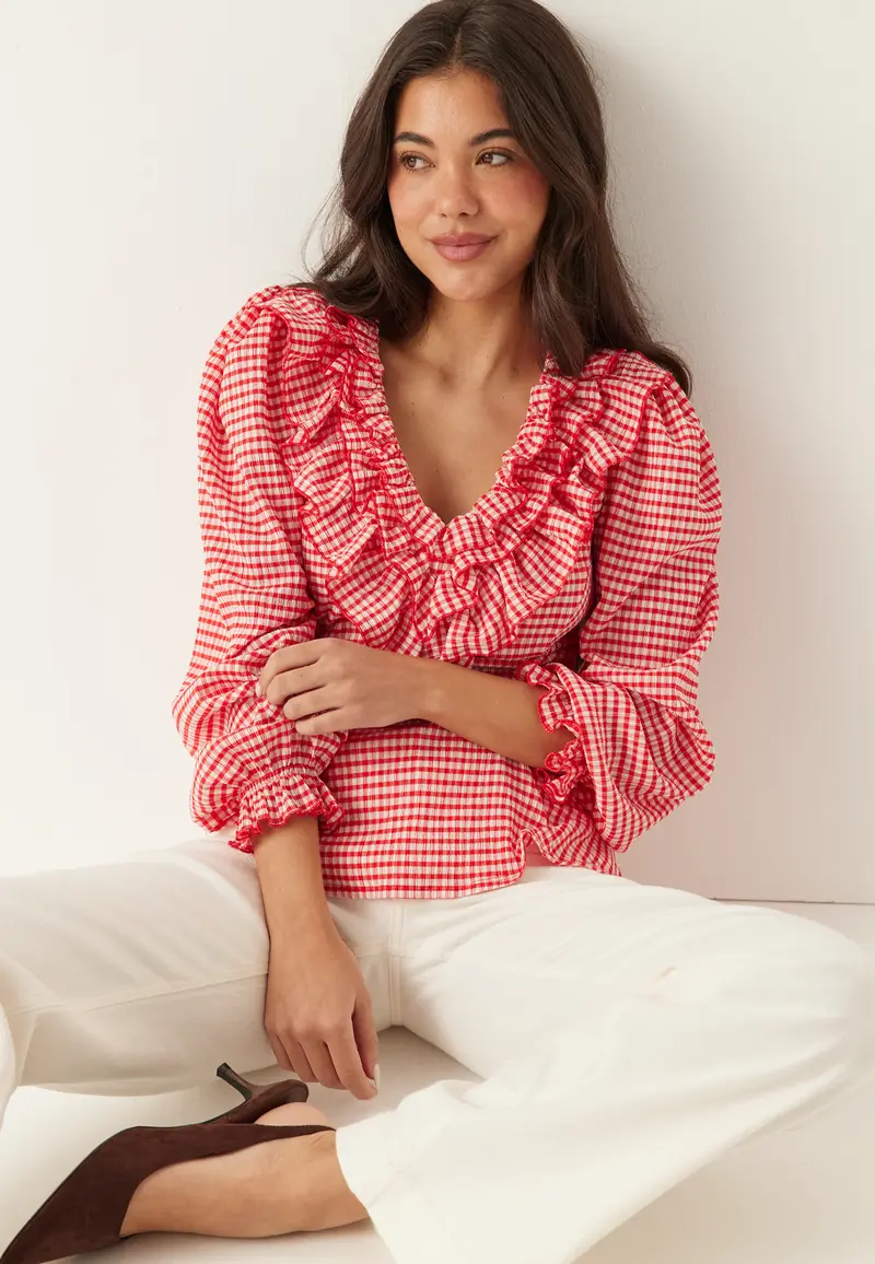 Jersey Frill Peplum Blouse