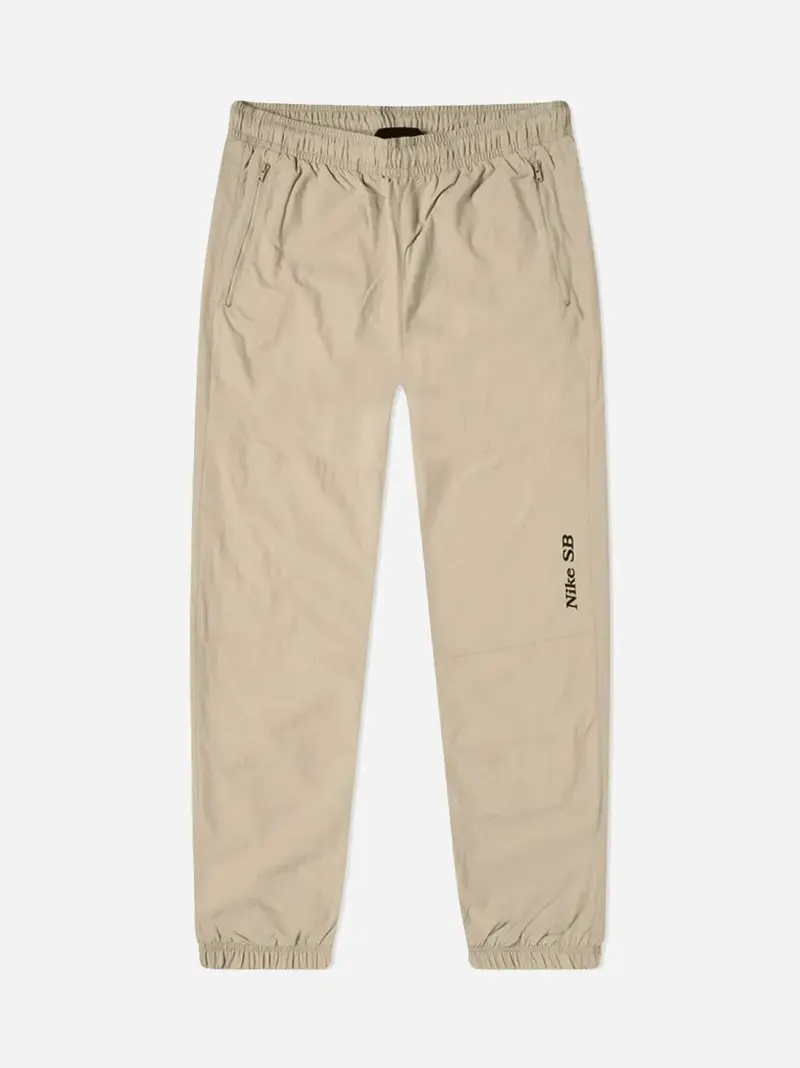 M NK SB Y2K GFX TRACK PANT - GRAIN/VELVET BROWN
