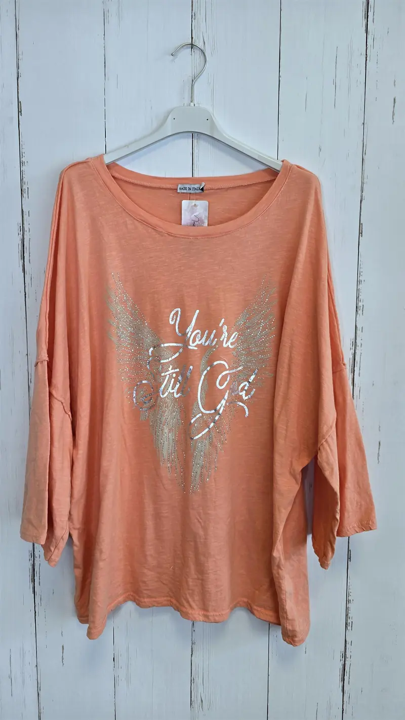 Orangefarget topp med glitterprint
