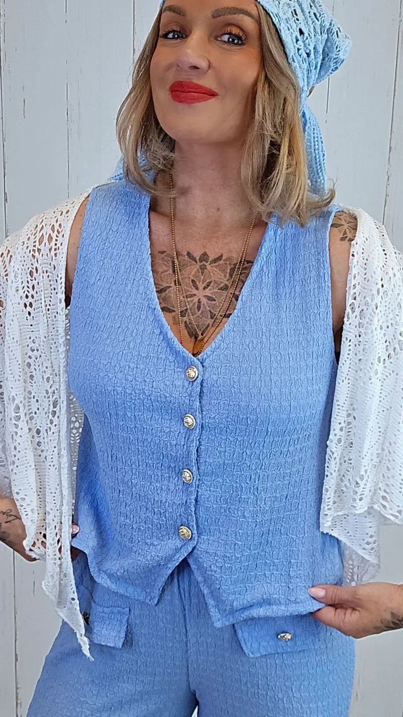 Stella strukturvest med gullknapper
